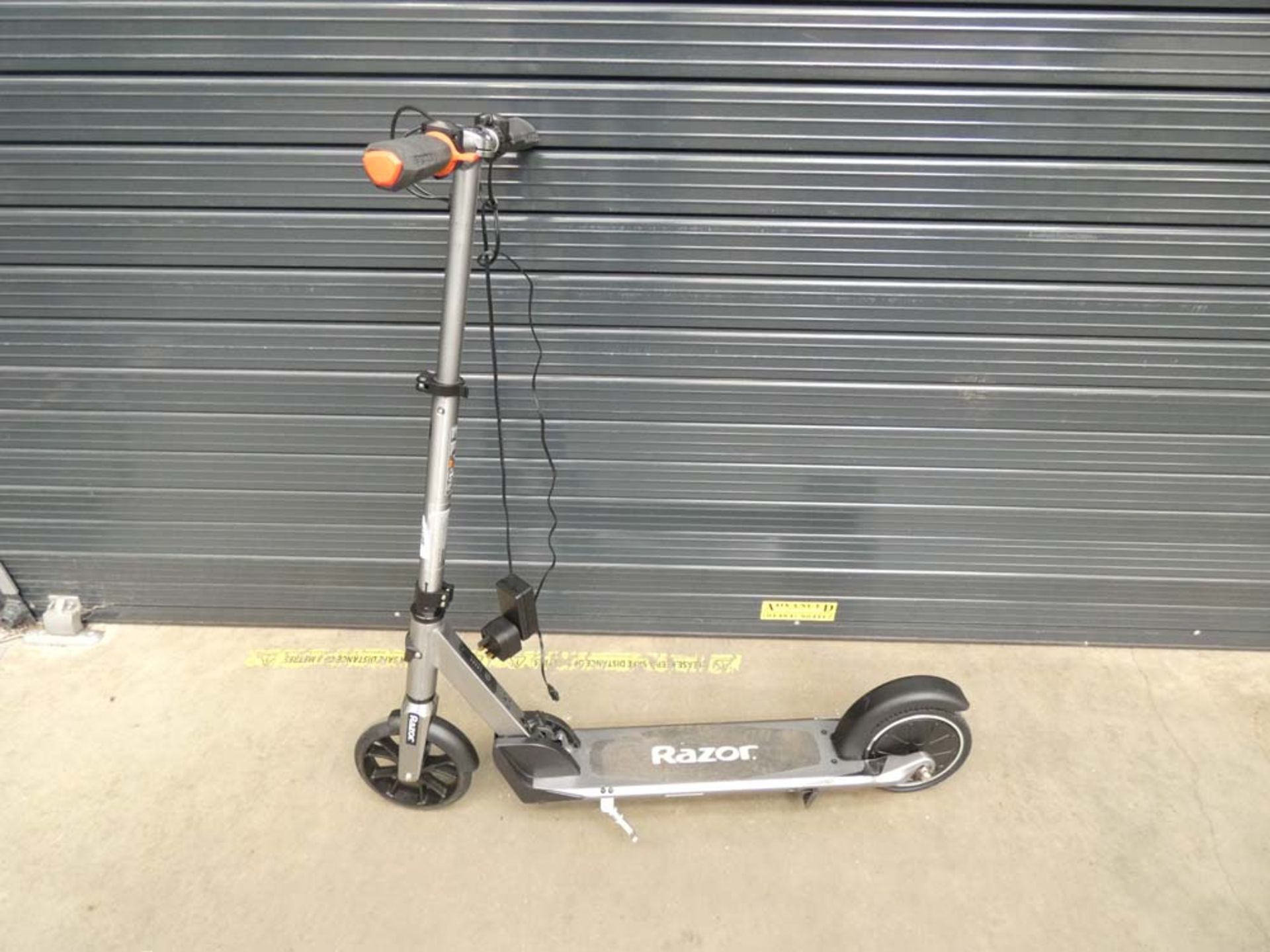 Silver Razor electric scooter with charger
