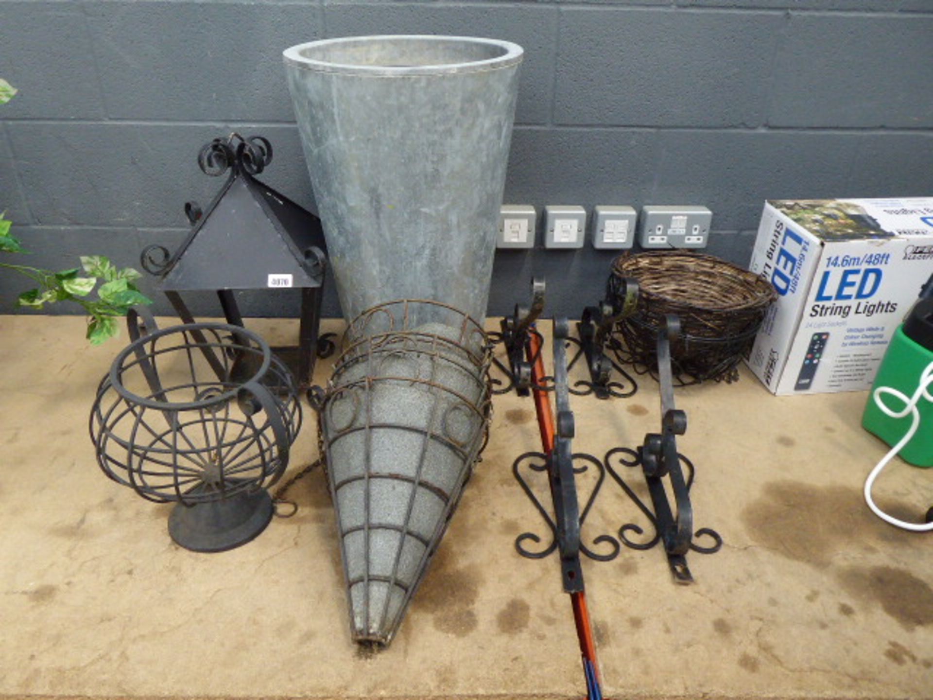 Galvanised plant pot, 4 hanging baskets, 4 hanging basket brackets, 2 light holders and some other