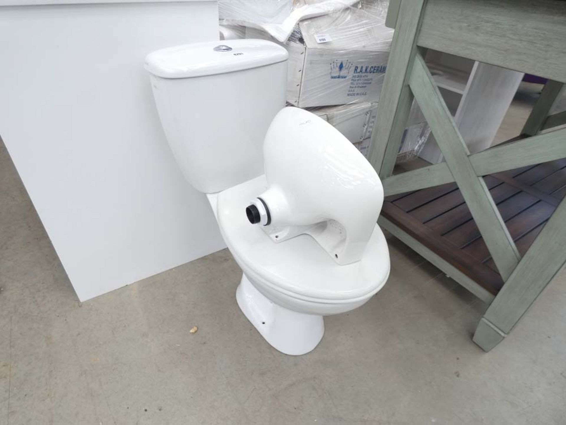 Toilet pan, cistern and small cloakroom sink