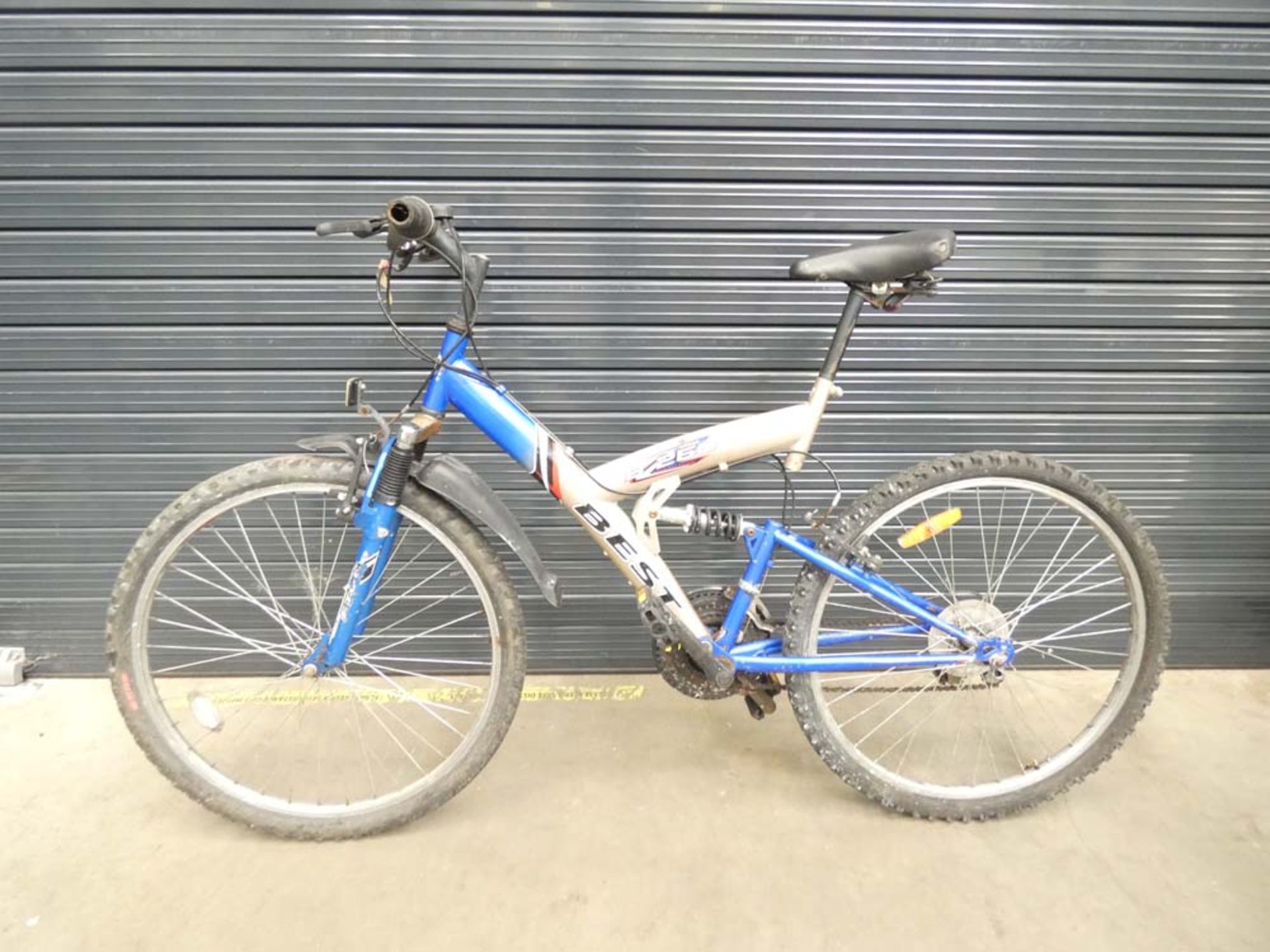 Gold and blue Best B250 suspension mountain bike