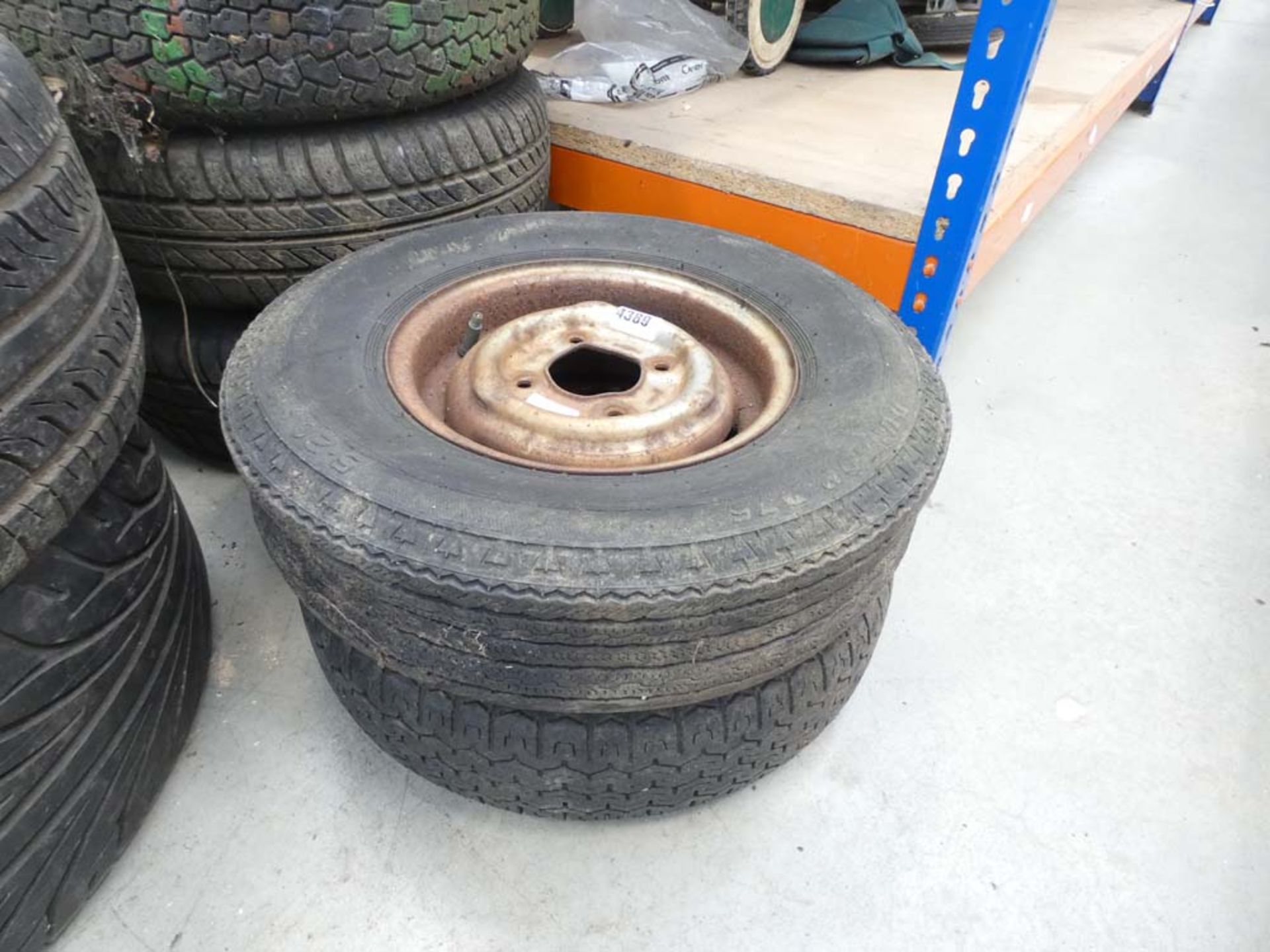 2 small steel rims and tyres