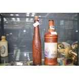 Two leather covered bottles, one with painted decoration