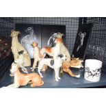 Cage of ornamental greyhounds and greyhound prints