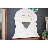 White heart shaped mirror