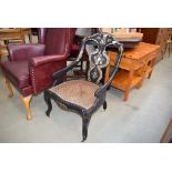 Ebonised cane seated chair with mother of pearl inlay