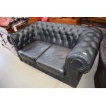 Black leather Chesterfield sofa