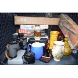 Case containing binoculars, china jugs, board games, Airfix kit etc