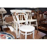 2 white painted kitchen chairs together with a cut down bentwood chair