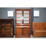 (2036RR) 13 - A Victorian mahogany bookcase cabinet, the glazed door enclosing adjustable shelves