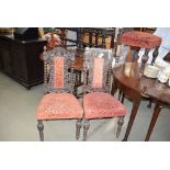 5290 - 5 heavily carved chairs with red fabric covering