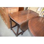 5221 - Oak drop leaf table on barley twist supports