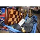 Box containing 2 electrified candlesticks, chess board, brass bell etc
