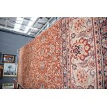 (9) 3.5m x 2.5m terracotta ground floral patterned rug