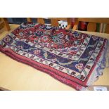 5143 - Floral patterned rug with pink edging