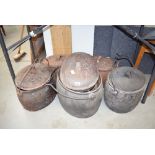 Quantity of cast cooking pots