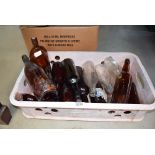 Box containing old bottles