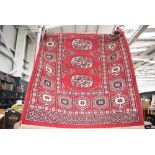 Small red thin rug