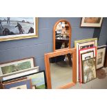 2 pine framed mirrors, one dome topped and the other rectangular