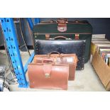 Quantity of suitcases and briefcases including Antler and Revelation