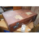 5087 - Leather suitcase with labels