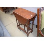 5162 - Oak drop leaf table on barley twist supports