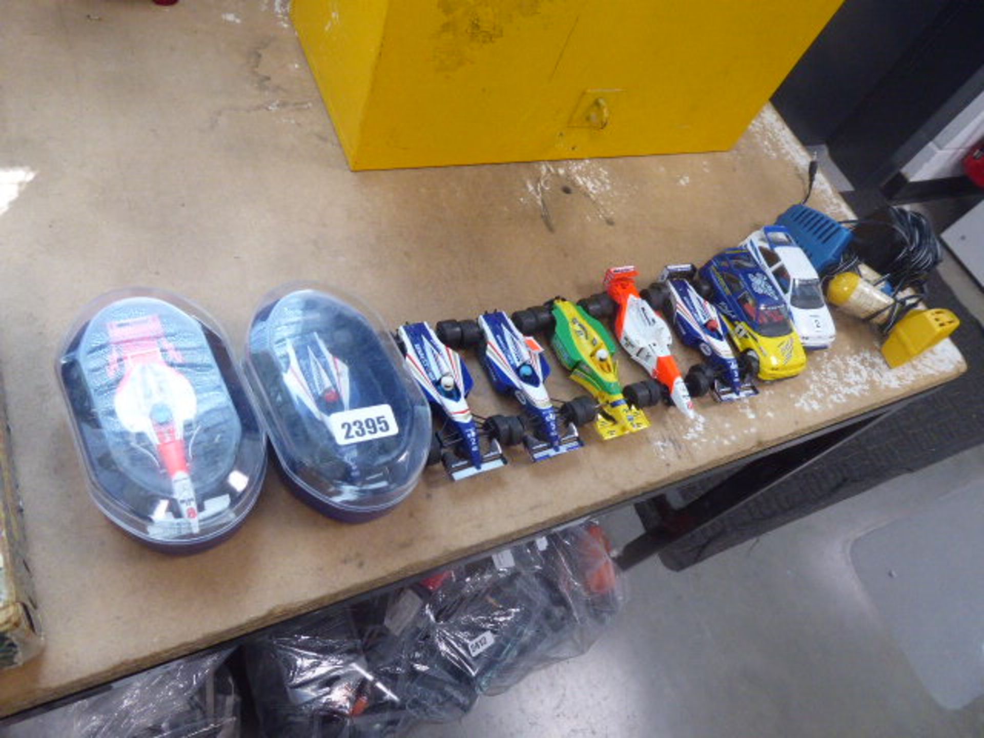 9 various Scalextric F1 and other vehicles inc. psu and 2 vintage controllers