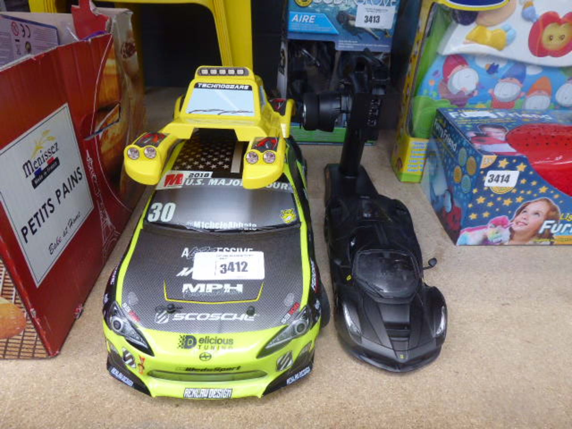Remote control car plus another model car