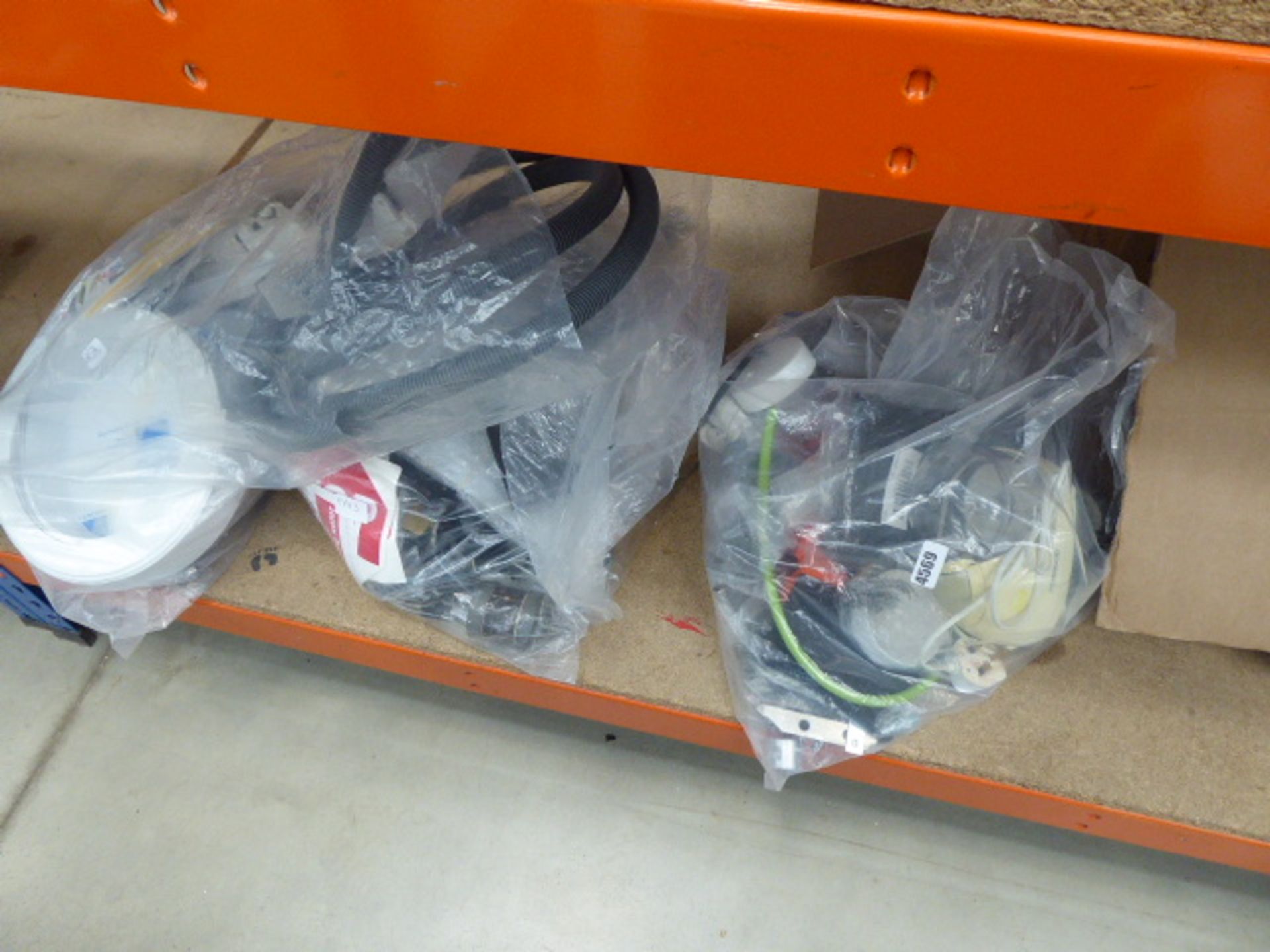 3 bags containing hose, washing machine parts, appliance parts, small blender, fixings, fuses,