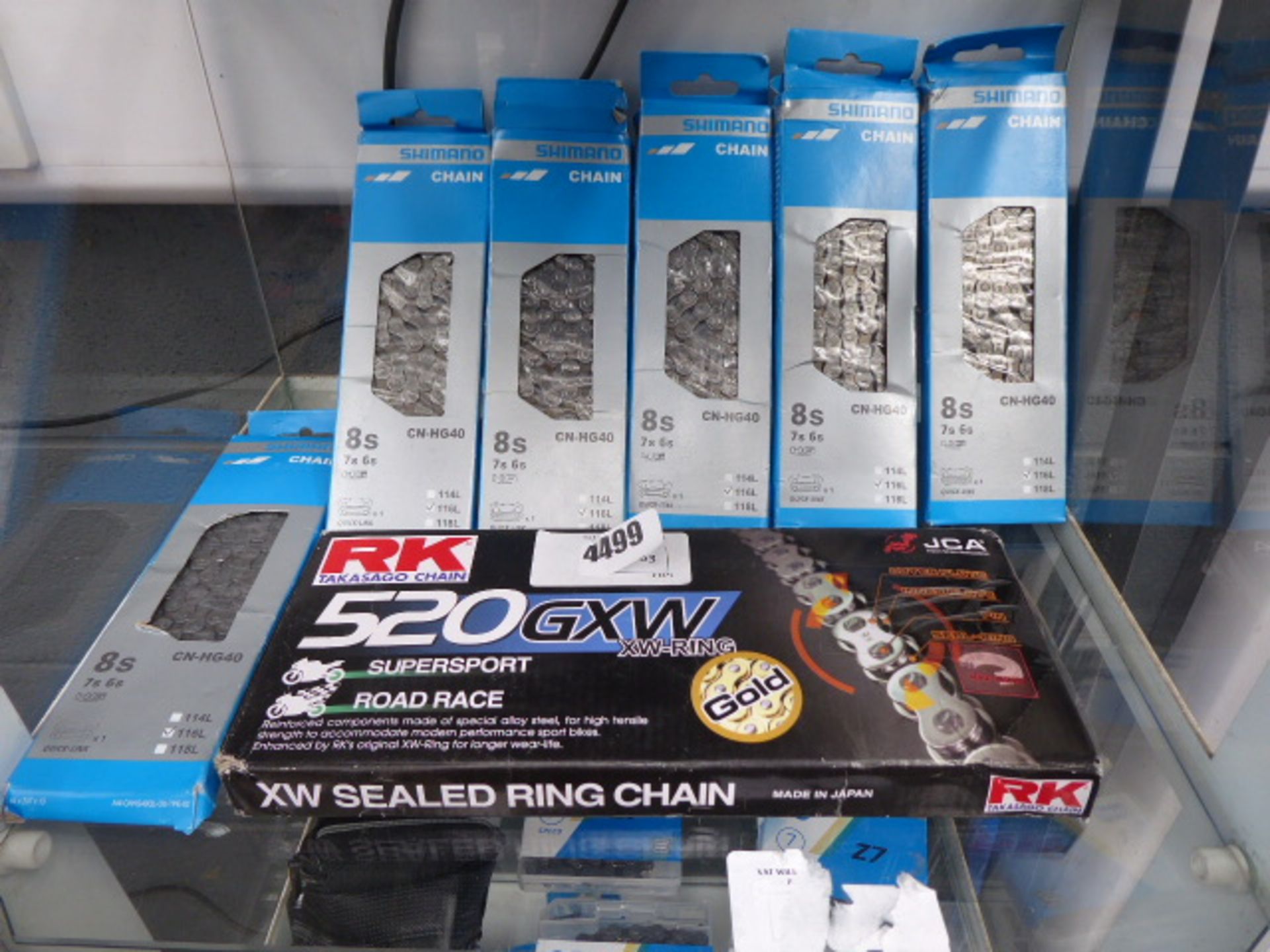 3 shelves of shimano kmc & rk bike and motor bike chains