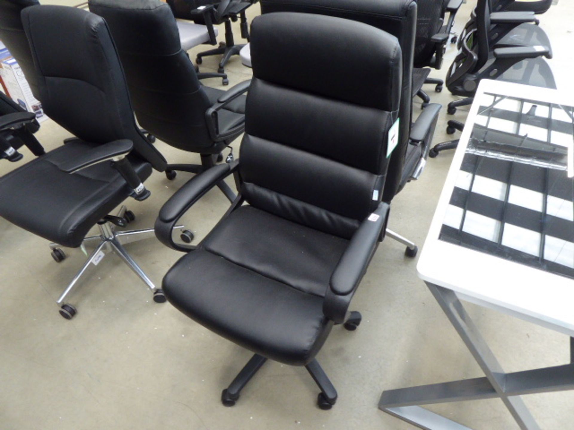 Black highback swivel armchair