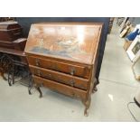 Chinese inspired bureau with three drawers under