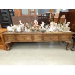 Low slung dark pine coffee table with two drawers