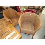 Two Lloyd Loom style armchairs