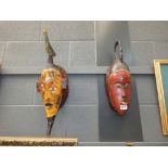 2 painted senufo style masks