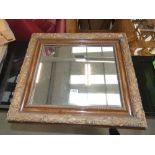 Rectangular mirror in decorative gilt frame