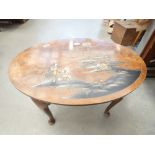Oval chinoiserie decorated coffee table