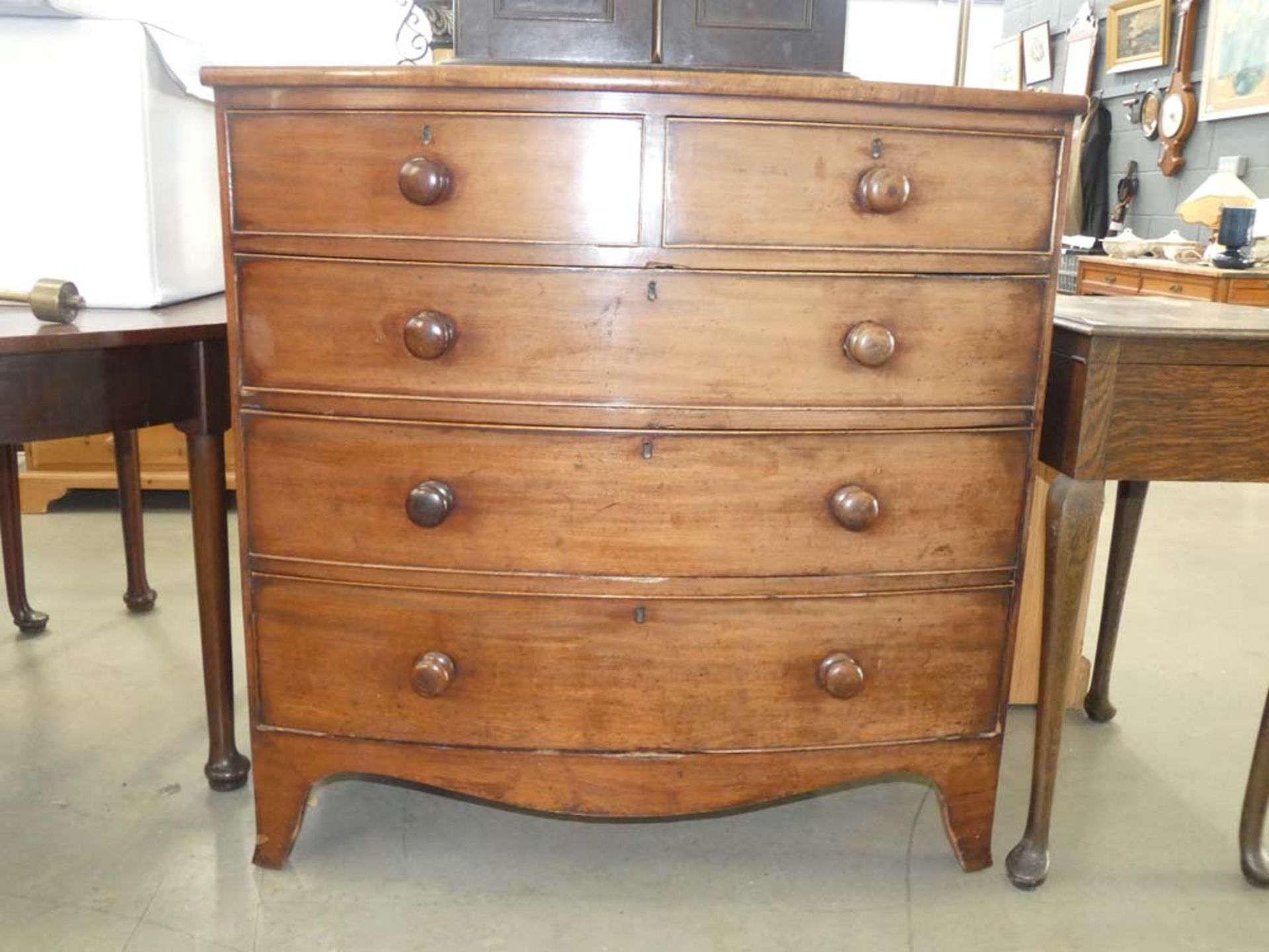 Bow fronted Victorian chest of 2 over 3 drawers