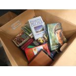 A box containing autobiographies and novels