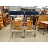 Pair of upholstered chrome stools