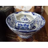 Two blue and white floral decorated bowls plus a lidded pot