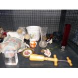 A cage containing: a corkscrew, teddy bear, Aynsley pot and glassware