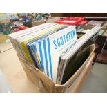 A box containing vinyl records