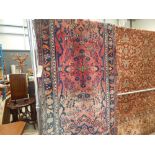 Multi coloured floral patterned Afghan mat