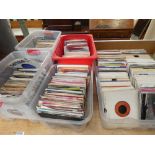 Sixteen boxes containing a large quantity of vinyl records