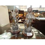 Pair of French bronze figures peasant girl and gardener