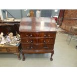 Reproduction mahogany bureau with three drawers under