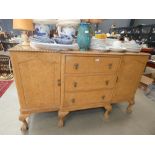 Walnut breakfront sideboard with 3 central drawers