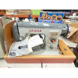 Cased electric Jones sewing machine