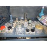 A cage containing salt dishes and inkwells