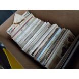 A box containing postcards